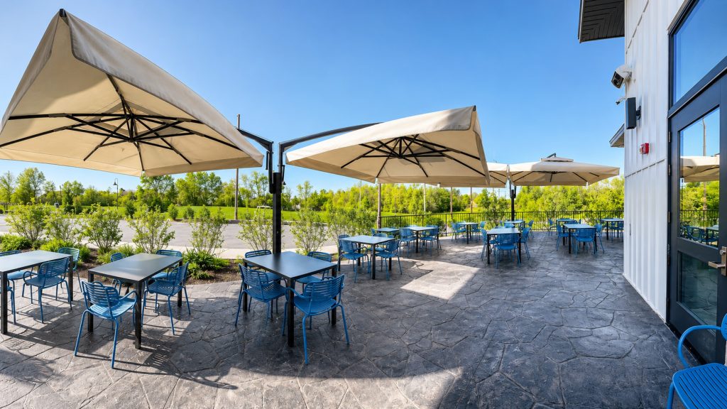 Patio tables and umbrellas outside Le Peep Valparaiso on Calumet Avenue